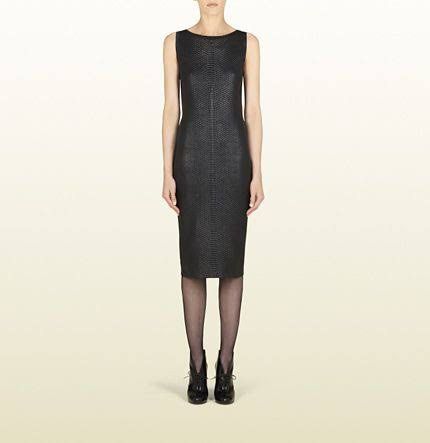 Gucci - Embossed Python SnakeSkin Dress (Category: Luxury Apparel) located in Dasmarinas. Submitted by goodbuyartisanal (Listing ID 1466048958, Image 1). Description: Gucci - Embossed Python Snakeskin Dress size Medium. Width 14 inches Length 36.5 inches Hem 16.5 inches Excellent Condition Price : 6,000 + ship Pm me.