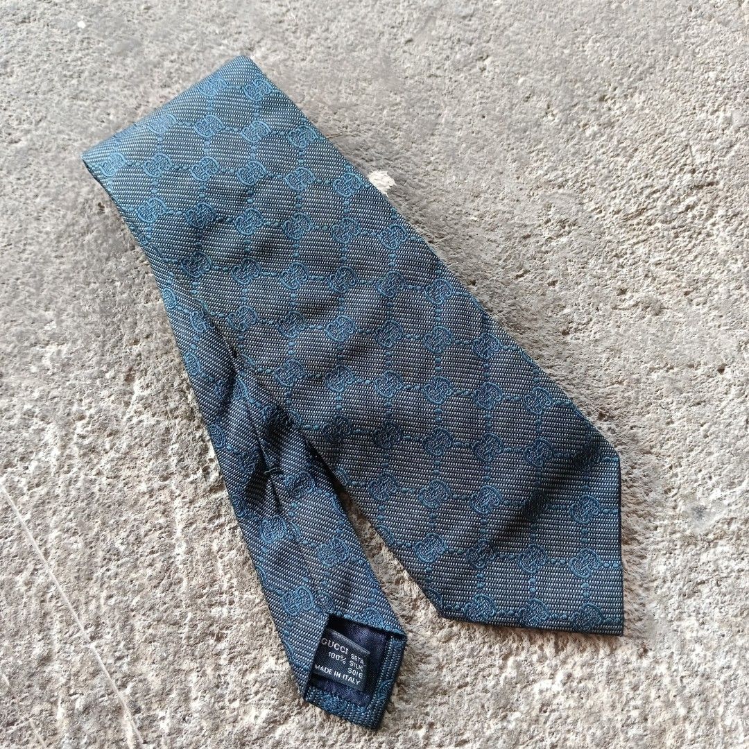 Gucci - Jacquard Necktie (Category: Ties) located in Bacolod City. Submitted by drop.ph (Listing ID 1466042743, Image 1). Description: Gucci - Jacquard Necktie *Measurements in inches W-3.8, Length - 58 *Excellent *No Flaws *Price: 2,000php *Add SF if outside Bacolod City.