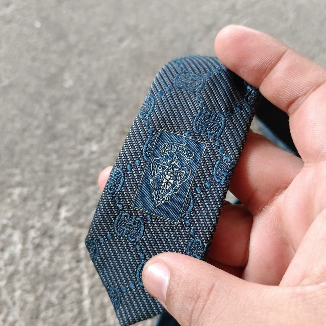 Gucci - Jacquard Necktie (Category: Ties) located in Bacolod City. Submitted by drop.ph (Listing ID 1466042743, Image 3). Description: Gucci - Jacquard Necktie *Measurements in inches W-3.8, Length - 58 *Excellent *No Flaws *Price: 2,000php *Add SF if outside Bacolod City.