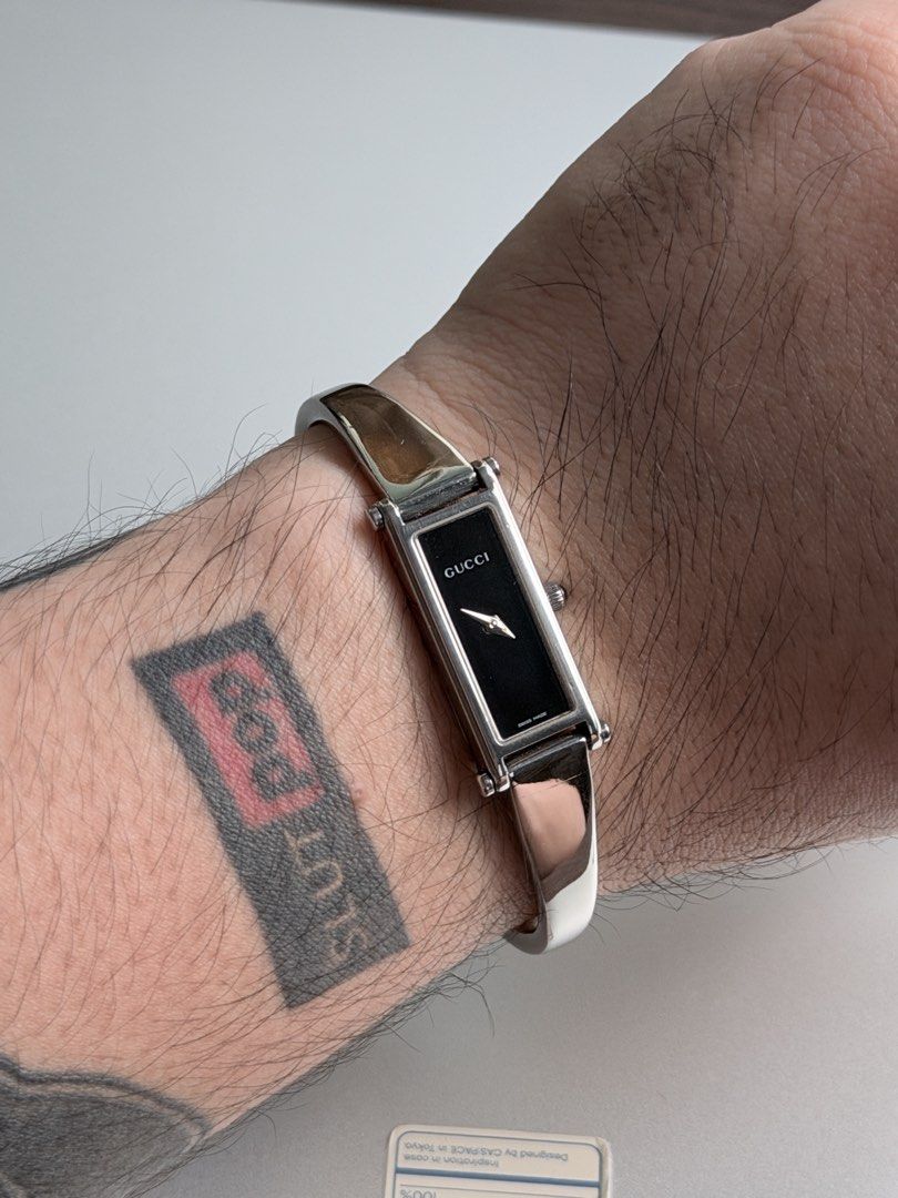 Gucci Bangle Watch Silver with Black Dial (Category: Luxury Watches) located in Quezon City. Submitted by succubusjpn (Listing ID 1466006497, Image 3). Description: Gucci 1500L Horsebit Bangle in Black Dial With Box Original and Vintage made from 1990-2005 Excellent condition Working and with service warranty active.