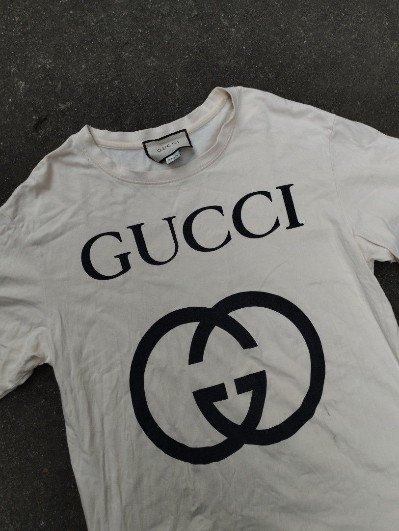 Gucci Big Print Tee (Category: Tshirts & Polo Shirts ) located in Manila. Submitted by neil_sellingaccount (Listing ID 1466084085, Image 2). Description: 21 width 29 length 9/10 color rate good condition issue: stains on back.