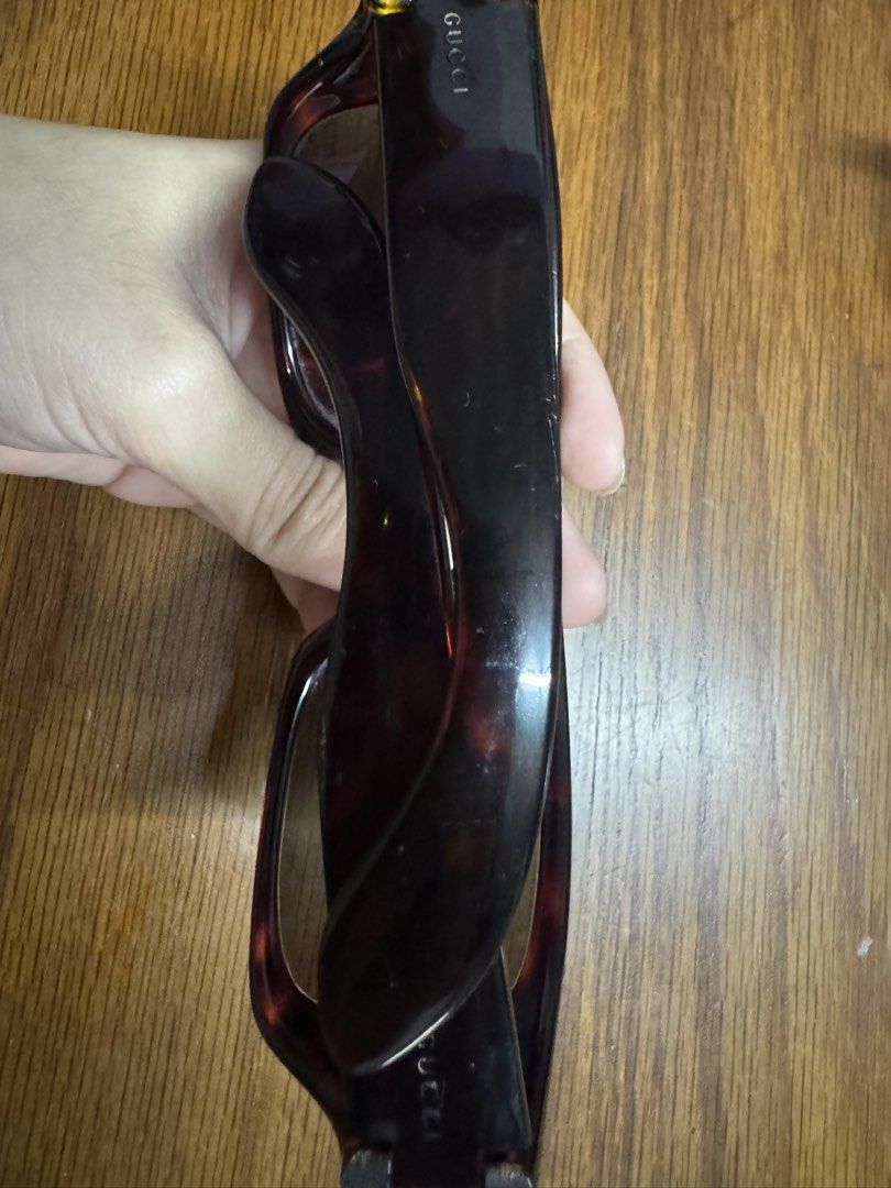 Gucci GG 1169/S Tortoiseshell Sunglasses (Category: Sunglasses & Eyewear) located in Las Pinas. Submitted by nekomeow22 (Listing ID 1466001071, Image 2). Description: - Brand: Gucci - Model: GG 1169/S 08E - Color: Classic Tortoiseshell Acetate - Size: 60-16-130 - Origin: Made in Italy - Lenses: Dark gradient - Authenticity: Clear serial numbers on inner arms - Condition: Minor surface scuffs from regular wear.