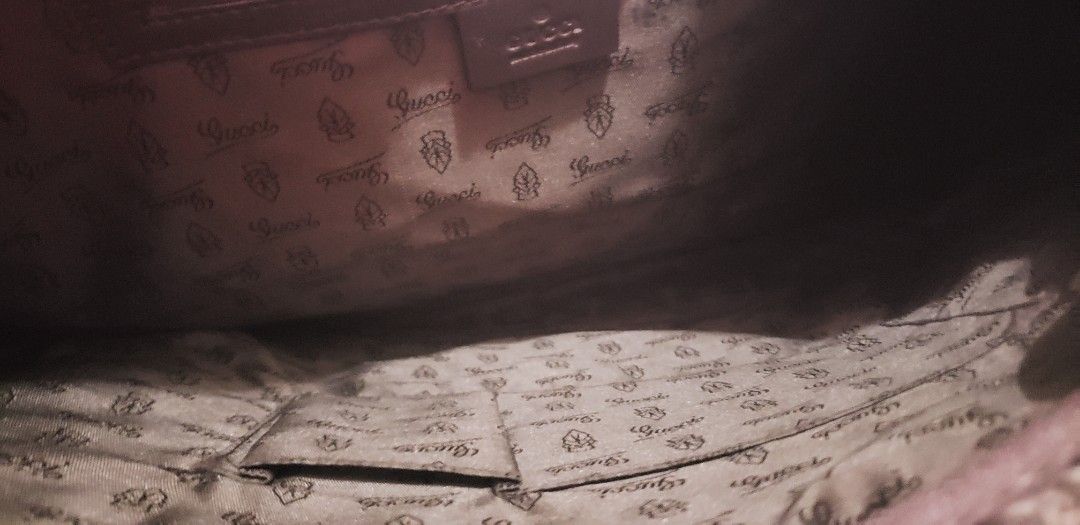 Gucci GG Guccissima Leather Briefcase Brown (Category: Luxury Bags & Wallets) located in Marikina City. Submitted by racoon143 (Listing ID 1465996499, Image 3). Description: - Authentic Gucci briefcase in dark brown Guccissima embossed leather - Classic interlocking G monogram pattern throughout - Secure double top handles and an adjustable/detachable matching shoulder strap - Elegant gold-tone hardware with engraved studs and zippers - Spacious 