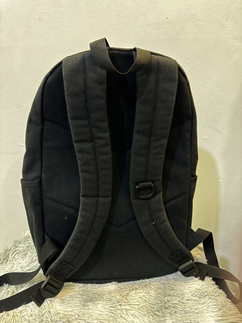 Harry Potter Dobby Is Free Black Canvas Backpack (Category: Backpacks) located in Urdaneta. Submitted by kathleenja24136 (Listing ID 1465958187, Image 2). Description: - Official Harry Potter Collection black canvas backpack - Embroidered 'Dobby Is Free' graphic with sock illustration - Secure main zip compartment and front zip pocket - Convenient side slip pockets for water bottles or essentials - Padded, adjustable shoulder straps for comfortab