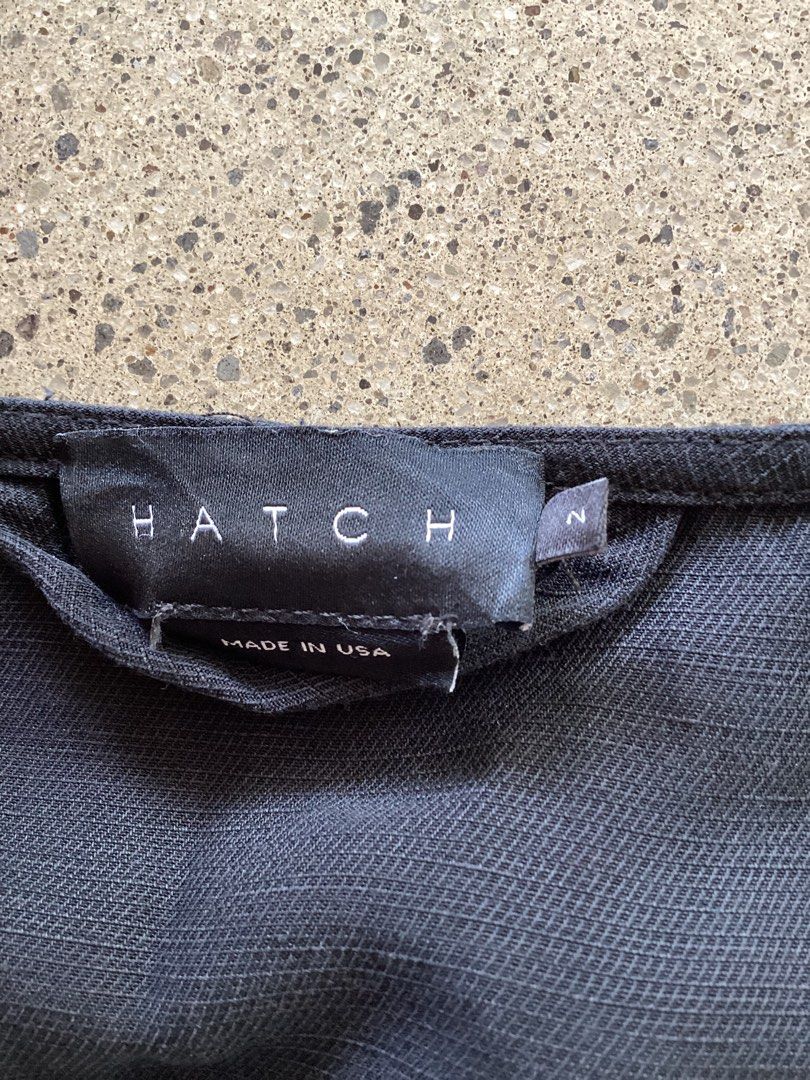 Hatch Black Jumpsuit Size 2 (Category: Jumpsuits) located in Bacoor. Submitted by cts217 (Listing ID 1465992263, Image 3). Description: - Brand: Hatch - Style: Short sleeve jumpsuit with V-neck and button front - Fit: Relaxed, lightweight, and comfortable - Size: 2 (Made in USA) - Condition: Clean, excellent, no flaws.