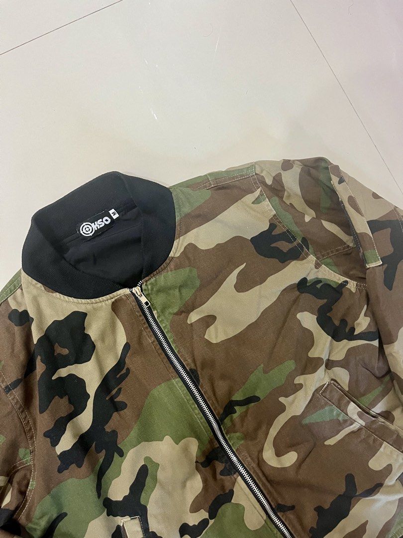 Haute Stuff Original (HSO) Camouflage Bomber Jacket Size M (Category: Coats, Jackets and Outerwear) located in Manila. Submitted by a.stmngo (Listing ID 1465967258, Image 2). Description: Size Medium on tag Width 23.5 inches Length 25 inches Good Condition 📍Manage your expectation. Item is used but not abuse 📍Nagcarlan, Laguna.