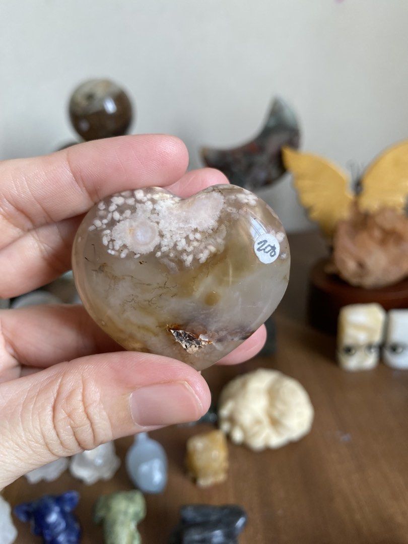 Heart Carvings (Category: Precious Stones) located in Manila. Submitted by amldeguzma50916 (Listing ID 1466137595, Image 1). Description: Heart Carving 95-200 php Tigers eye -95 Petrified wood-140 Sakura Agate-200 .