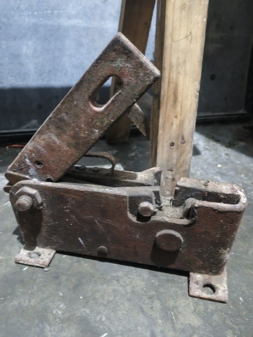 Heavy-Duty Bar Cutter (Category: Locks, Doors & Gates) located in Caloocan City. Submitted by dmrosxix (Listing ID 1466111971, Image 2). Description: - Material: Heavy solid iron with authentic heavy rust and weathering - Mechanism: Pivoting lever arm operation - Installation: Built-in mounting holes on the base for secure setup - Condition: Vintage, rustic, untouched - Best For: DIY restoration projects, rustic home decor, or vintage hardware co