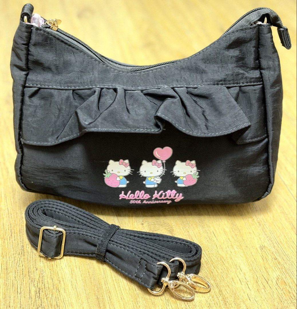 Hello Kitty 50th Anniversary foldable shoulder bag (Category: Cross-body Bags) located in Bacolod City. Submitted by quickocean-c957 (Listing ID 1466080370, Image 1). Description: .