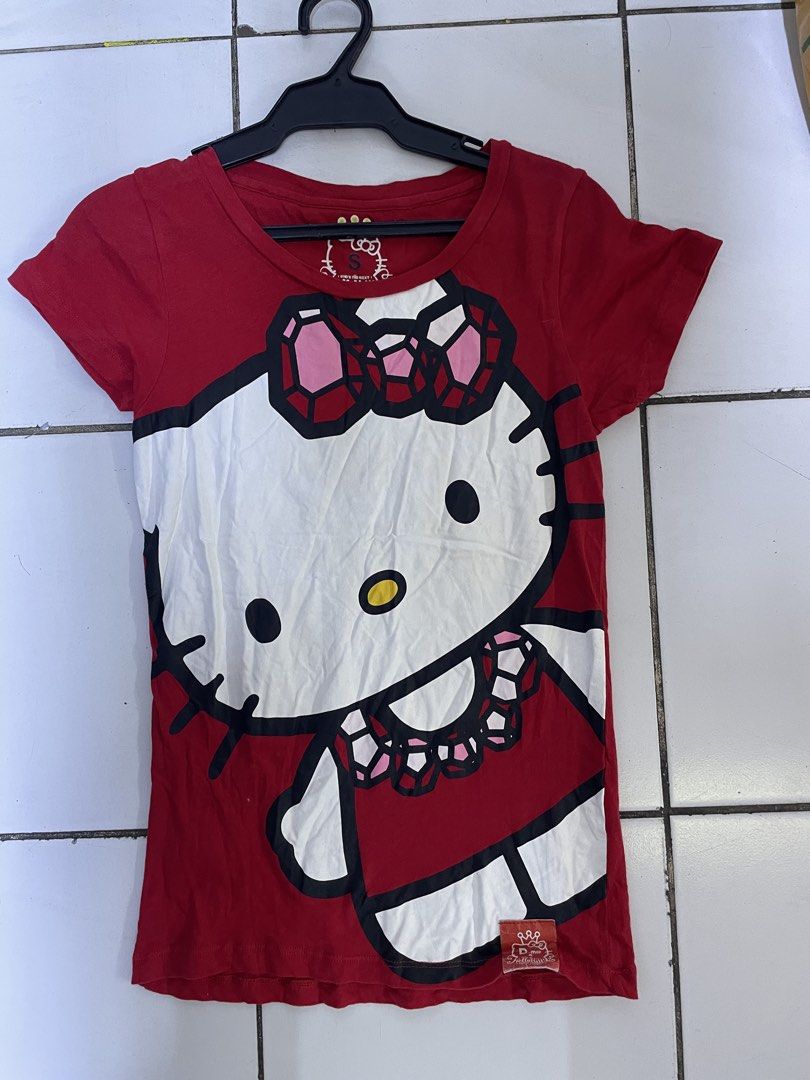 Hello kitty blouse (Category: Blouses) located in Lucena. Submitted by riyizthriftz (Listing ID 1465953953, Image 1). Description: Hello kitty blouse Small on tag Good condition Color rate 9/10.