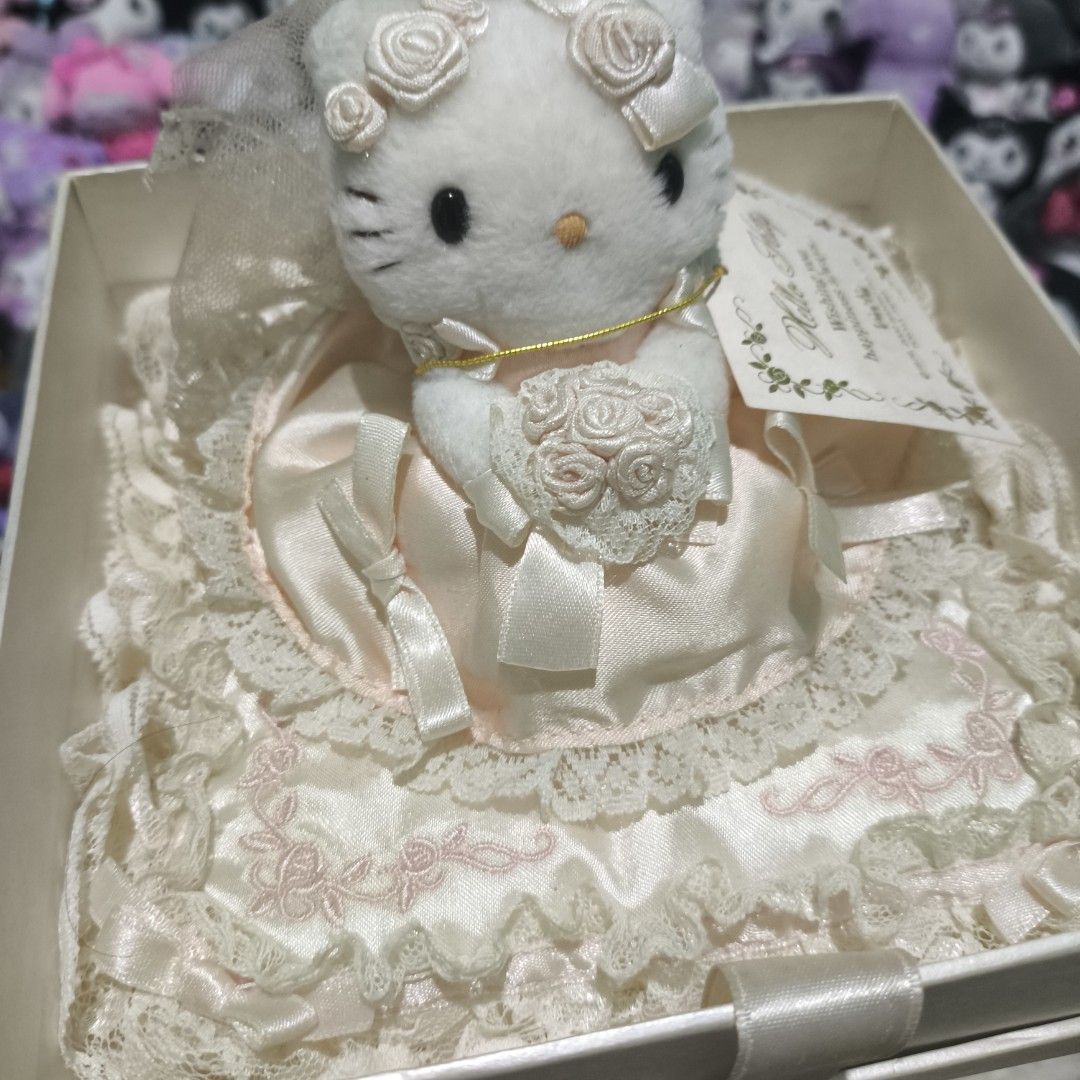 Hello Kitty Wedding Vivitix (Category: Plushies & Soft Toys) located in Manila. Submitted by kuromixx_ (Listing ID 1465968533, Image 2). Description: -have stain below of the pillow -vintage -fade color.