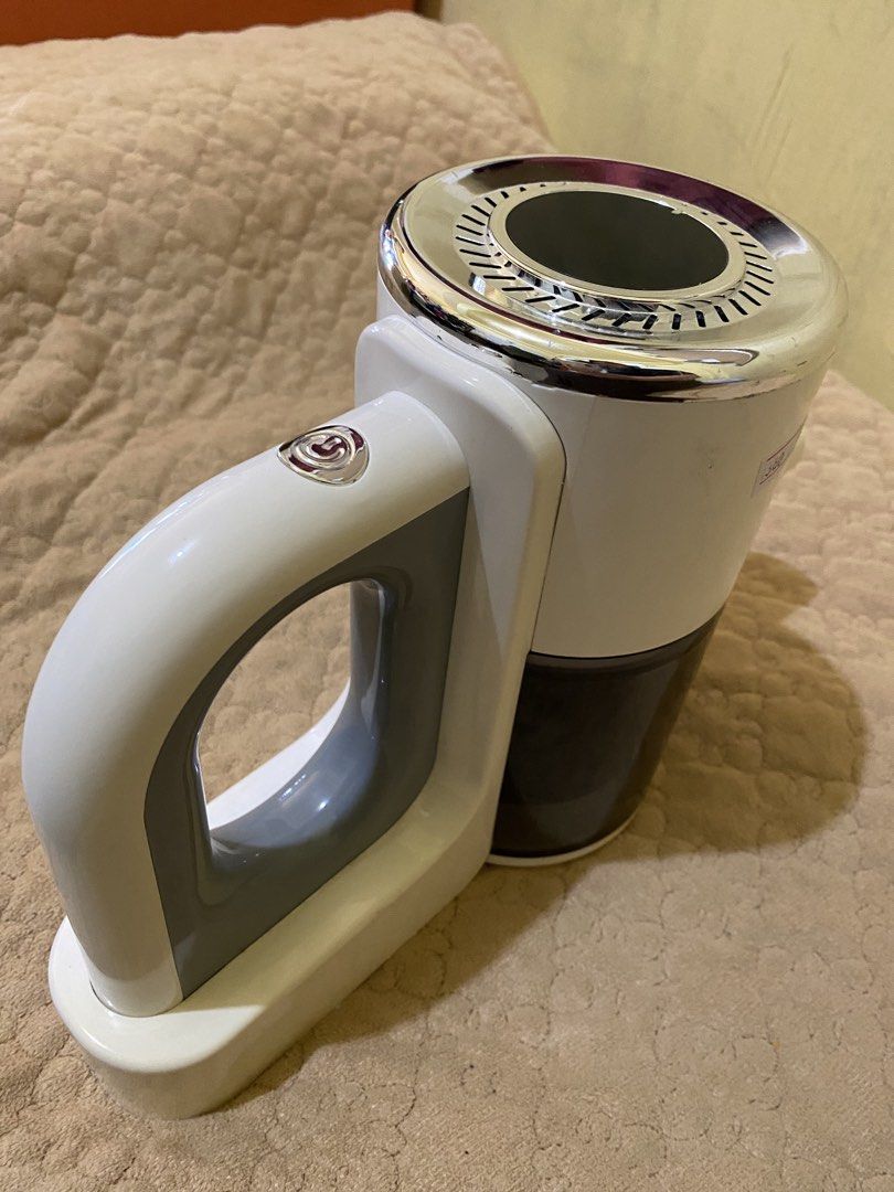 HK-V8 Cordless Handheld Vacuum Cleaner (Category: Vacuum Cleaner & Housekeeping) located in Baguio. Submitted by thrift_bonita (Listing ID 1466034630, Image 2). Description: HK-V8 model wireless vacuum cleaner. White and grey body with transparent dark dust cup. 100W rated power, 12V working voltage, 880ml dust capacity. Compact size, easy to grab handle with power button on top. Sticker label on bottom lists specs clearly. Used condition with so