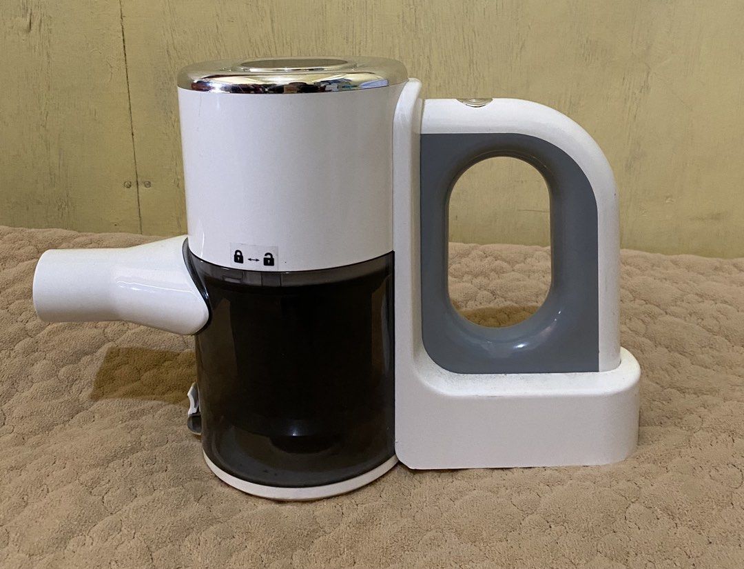 HK-V8 Cordless Handheld Vacuum Cleaner (Category: Vacuum Cleaner & Housekeeping) located in Baguio. Submitted by thrift_bonita (Listing ID 1466034630, Image 1). Description: HK-V8 model wireless vacuum cleaner. White and grey body with transparent dark dust cup. 100W rated power, 12V working voltage, 880ml dust capacity. Compact size, easy to grab handle with power button on top. Sticker label on bottom lists specs clearly. Used condition with so