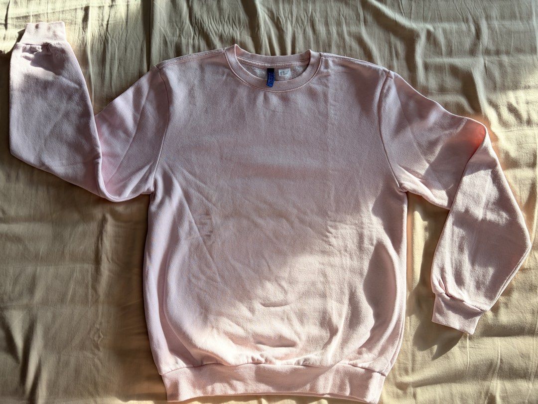 H&M Divided Pink Sweatshirt Size XS (Category: Coats, Jackets and Outerwear) located in Quezon City. Submitted by makingroomfinds (Listing ID 1466066100, Image 1). Description: - Brand/Line: H&M Divided Basic - Color: Plain Pink - Size: XS - Style: Classic crewneck with ribbed cuffs and hem - Lining: Soft fleece inside for extra warmth - Pairing: Great for casual wear with jeans or joggers.