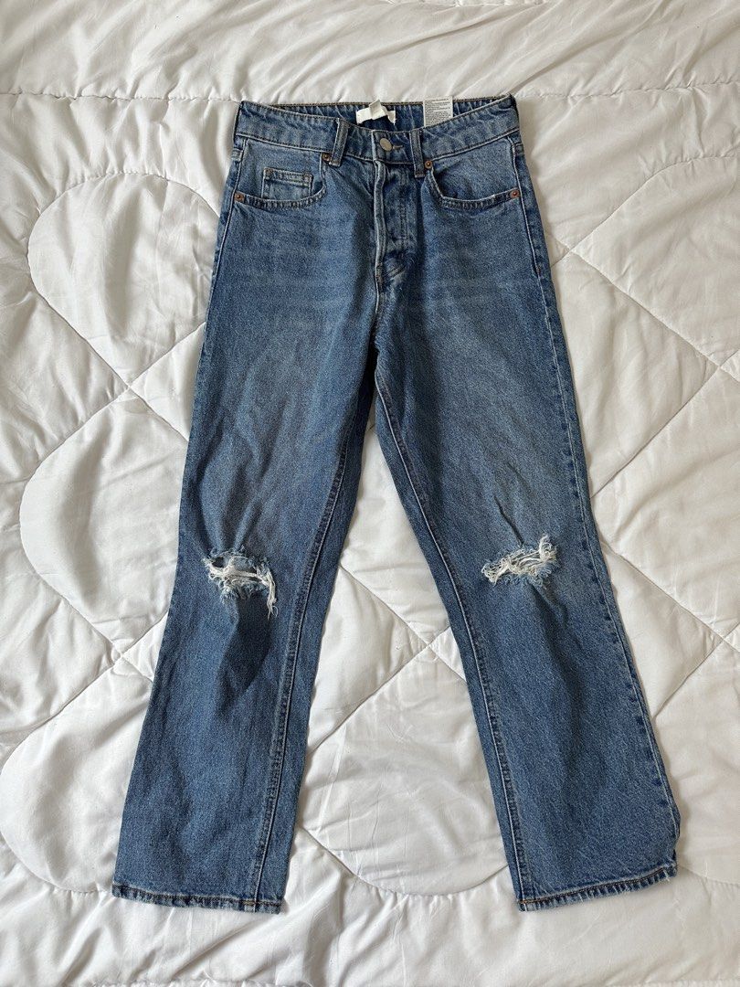 H&M Ripped Distressed Denim Jeans Size US 4 (Category: Jeans) located in Makati City. Submitted by walkw1thstyle (Listing ID 1466049635, Image 3). Description: - Brand: H&M - Style: High waist with button fly closure and classic five-pocket styling - Details: Trendy distressed knee rips on both legs - Size: EUR 36 / US 4 / CN 160/68A - Color/Wash: Medium wash blue denim.