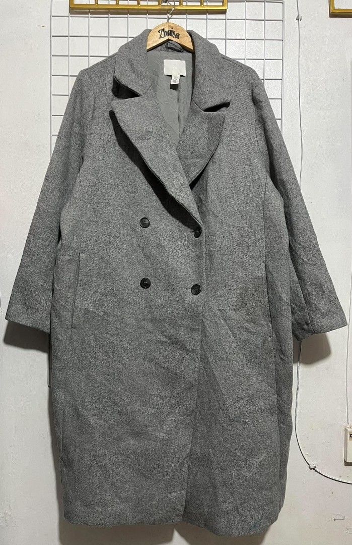 H&M Wool Blend Double-Breasted Overcoat (Category: Coats, Jackets and Outerwear) located in Pagsanjan. Submitted by thriftyclothes33 (Listing ID 1466110685, Image 3). Description: 🔥 H&M Wool Blend Double-Breasted Overcoat 💰 PRICE: ₱1150 + shipping fee 🩶 Classic grey long overcoat made with a wool blend, featuring structured notch lapels, relaxed fit & side pockets. Perfect for layering during cold weather. 🏷️ Size: 2XL on tag 📏 Width: 27" | 