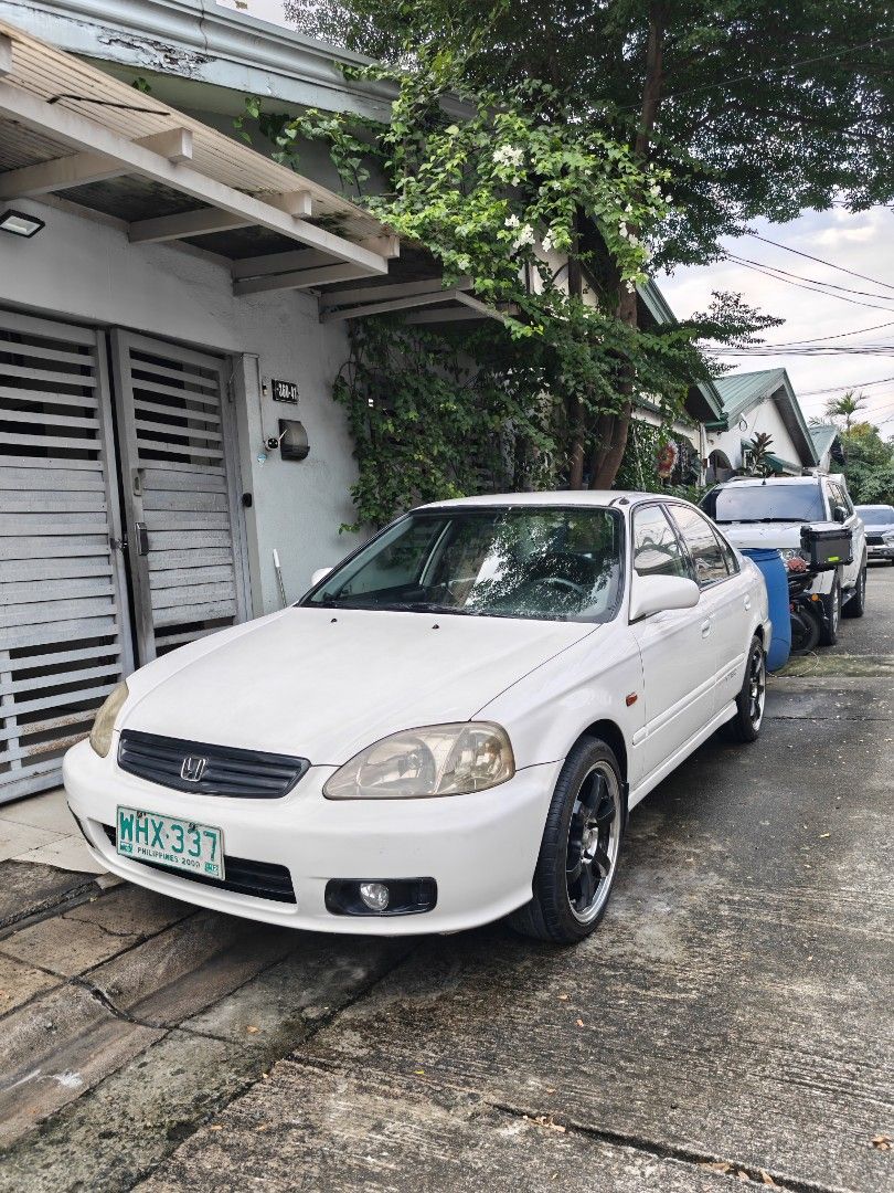 Honda Civic Lxi Auto (Category: Used Cars) located in Quezon City. Submitted by tanramoni (Listing ID 1466051675, Image 3). Description: For sale: Honda Civic Lxi 1999 Sir body padek 454 Automatic transmission All stock all original except sa mags 1.5 sohc engine very fuel efficient Keyless entry Original stanley headlights and tail lights Newly changed oil (Fully synthetic, Motul oil) Brandnew battery Brandnew sparkplug, oil filter, gas filter, 