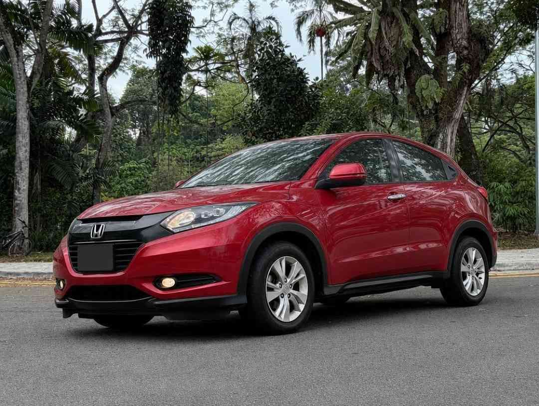 Honda Vezel 1.5 X (A) (Category: Used Cars) located in Singapore. Submitted by carousell_certified_partners (Listing ID 1466042715, Image 1). Description: Lifetime Engine Warranty provided for your peace of mind! Previous owner was a retired businessman, with the car meticulously cared for. Immaculate pristine condition inside out, with no undercarriage noise. Engine and gearbox perform flawlessly and smooth!Drive&Go unit. All trade-ins welcome. 