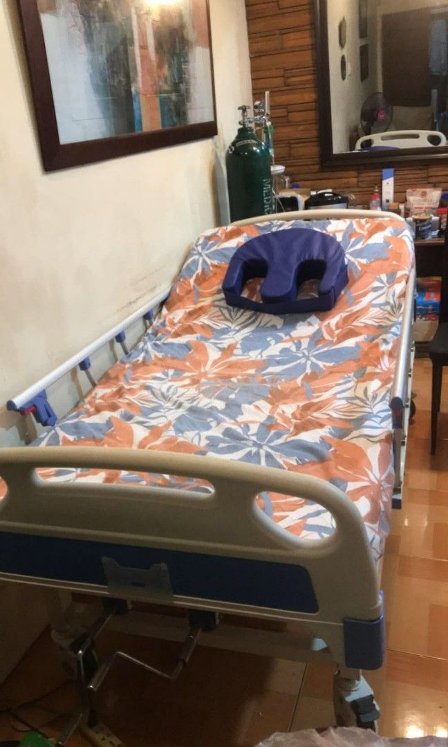 Hospital bed (Category: Other Assistive Aids) located in Manila. Submitted by johnrhonde59445 (Listing ID 1466059741, Image 1). Description: 2 crank hospital bed w/o foam, 1 commode, 1 turn assistant pillow and 2 packs medium size diaper (32"-44").