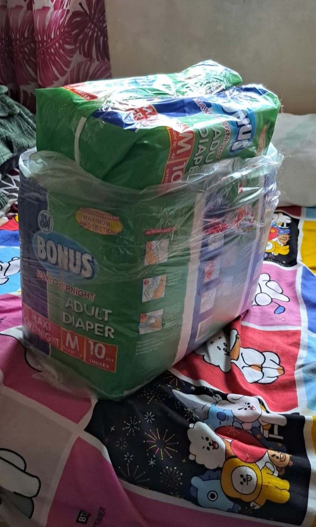 Hospital bed (Category: Other Assistive Aids) located in Manila. Submitted by johnrhonde59445 (Listing ID 1466059741, Image 3). Description: 2 crank hospital bed w/o foam, 1 commode, 1 turn assistant pillow and 2 packs medium size diaper (32"-44").