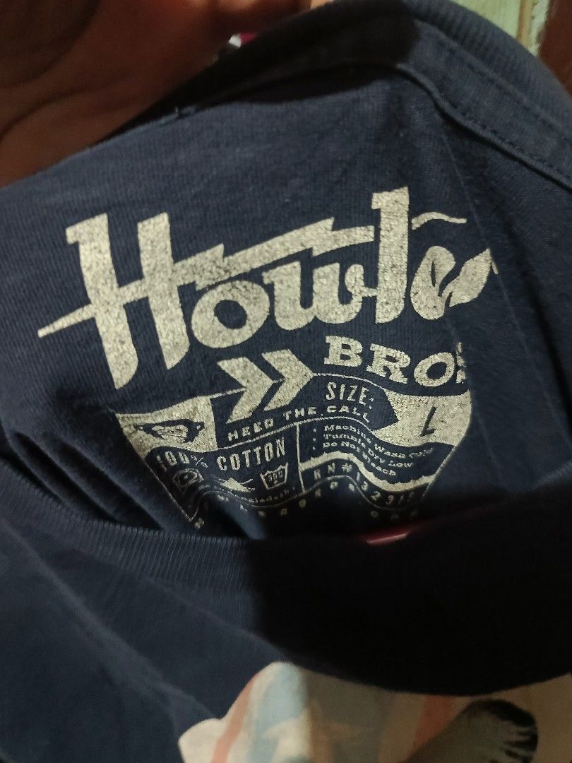 Howler Bros Long Sleeve Monkey Graphic Tee Size L (Category: Tshirts & Polo Shirts ) located in Manila. Submitted by christian_22 (Listing ID 1466044895, Image 2). Description: - Brand: Howler Bros - Style: Long sleeve graphic tee - Color: Dark navy blue - Size: L - Material: 100% cotton - Details: Monkey wearing star/stripes helmet graphic, 'HEED THE CALL' lettering on one sleeve, stars on the other sleeve, and a small monkey patch near the hem.