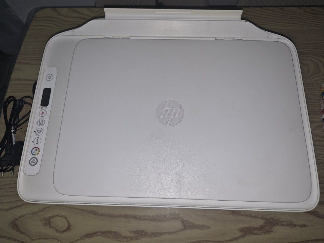 HP All-in-One Printer with Power Cord and Cable (Category: Printers, Scanners & Copiers) located in Antipolo. Submitted by jolp_madz (Listing ID 1466080282, Image 2). Description: - Model: HP Multifunction Printer (White) - Condition: Clean exterior body, ready for setup - Size: Compact desk-friendly design - Features: Control panel with power button, wireless indicator, and status screen; folding back paper tray - Inclusions: Power cable and USB