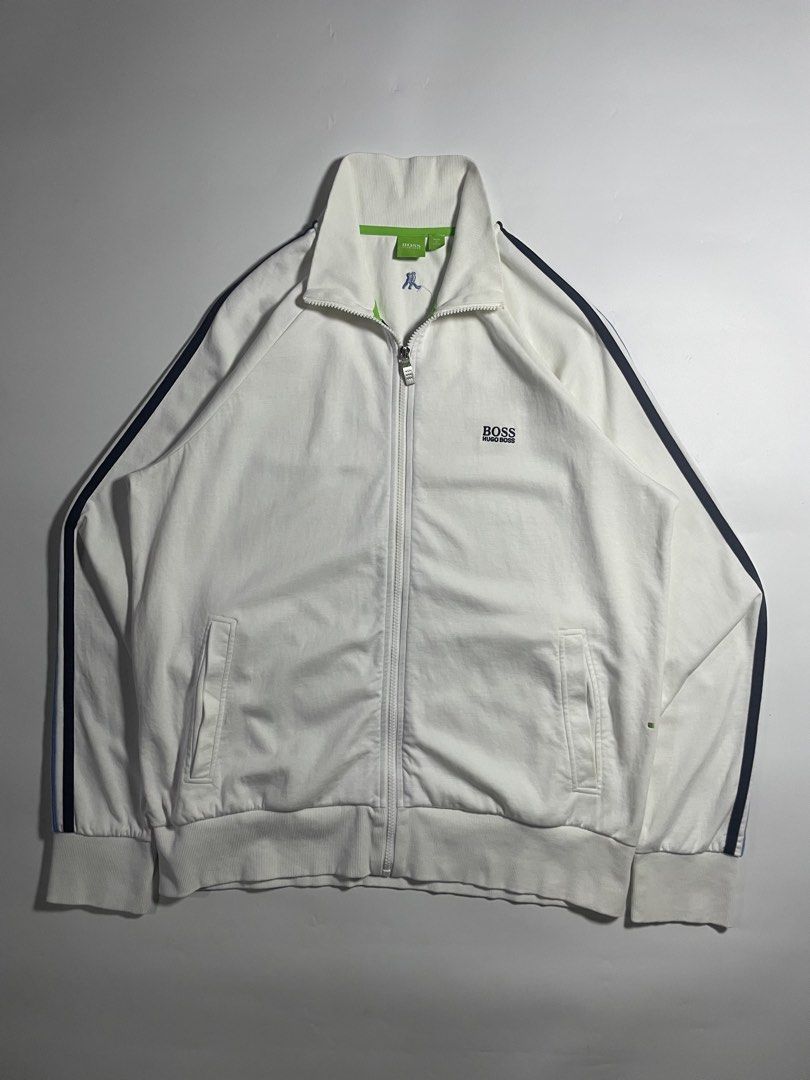 Hugo Boss Track Jacket (Category: Luxury Apparel) located in Bais. Submitted by christian.complexthrift08 (Listing ID 1466087679, Image 1). Description: Hugo Boss Track Jacket (In Excellent Condition) Color: White Size: X Large on tag Width: 23.5 inches Length: 28.5 inches Condition: 9.5 / 10 Issue: minor stains Scratch sa likod Price: 1550 + 79 shipping fee Via JNT express.