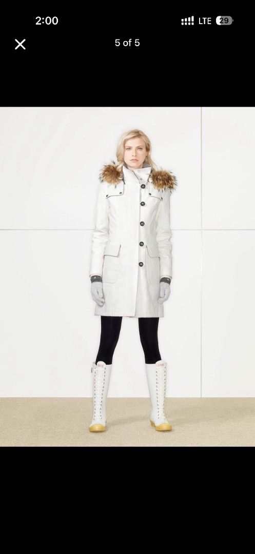 Hunter White Fur Hooded Winter Parka Coat (Category: Coats, Jackets and Outerwear) located in Manila. Submitted by thebestre (Listing ID 1466095068, Image 1). Description: White winter parka from Hunter. Includes a large hood lined with brown faux fur. Front buttons and zip closure with deep pockets on the sides. Ribbed cuffs keep out the cold. Stylish structured cut keeps you warm during winter weather. Great option for snow days or cold city co