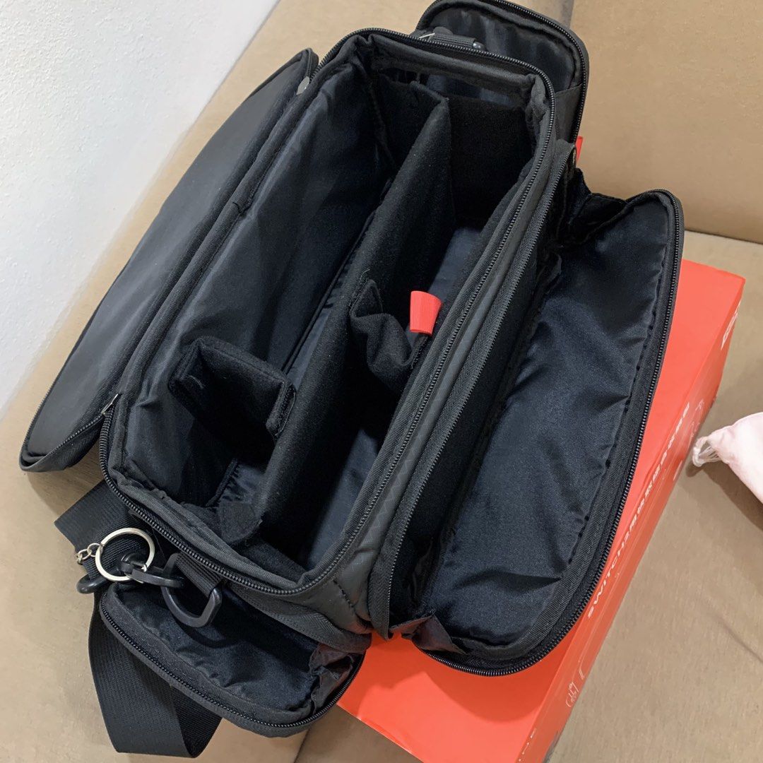 IINE Carrying Storage Bag for Nintendo Switch 2 Black (Category: Cases & Covers) located in Imus. Submitted by shavogamingph (Listing ID 1466084136, Image 3). Description: ✅ Item in good condition ✅ No issue, slightly used only IINE Travel Bag for Nintendo Switch 2 Comes with strap and box 📍 Imus Cavite Pick up/ Meetup Lalamove 🛵 COD is Available.