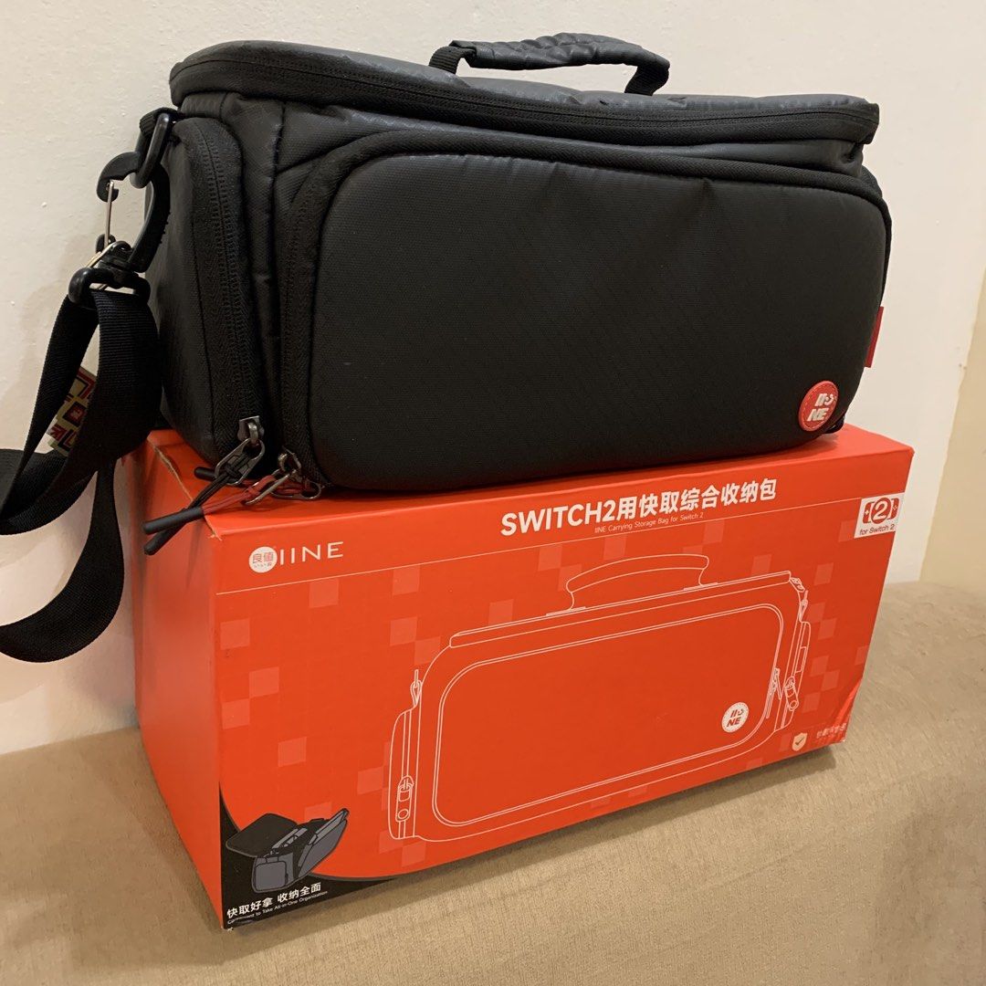 IINE Carrying Storage Bag for Nintendo Switch 2 Black (Category: Cases & Covers) located in Imus. Submitted by shavogamingph (Listing ID 1466084136, Image 2). Description: ✅ Item in good condition ✅ No issue, slightly used only IINE Travel Bag for Nintendo Switch 2 Comes with strap and box 📍 Imus Cavite Pick up/ Meetup Lalamove 🛵 COD is Available.