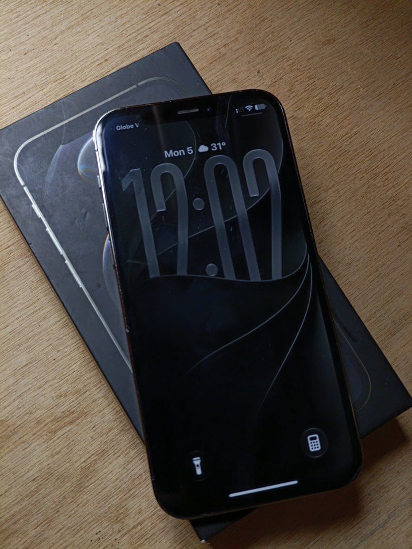 iPhone 12 Pro Graphite (Category: iPhone 12 Series) located in Cavite. Submitted by vaneexz (Listing ID 1465988841, Image 2). Description: Model: iPhone 12 Pro Graphite Storage: 128GB Battery Health: 70% Condition: Excellent working condition, NO REPLACED PARTS ALL ORIGINAL. Features: True Tone working, Face ID working, all buttons working, no sim restrictions / openline, NTC Approved. Signs of Usage ( casemarks ) - with original box, UGreen char