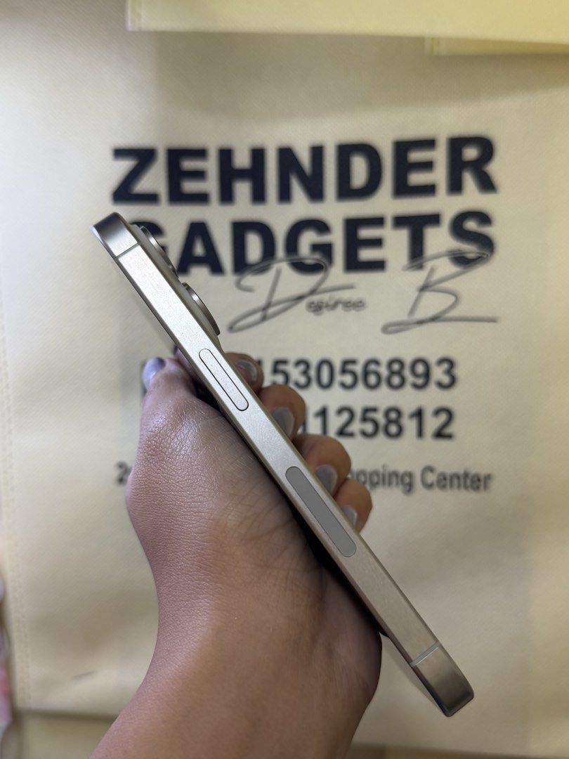 iPhone 15 PRO 256GB OPENLINE (E-SIM) NO SIM RESTRICTIONS (US VARIANT) (Category: iPhone 15 Series) located in San Juan City. Submitted by desireebayal96 (Listing ID 1465972982, Image 3). Description: iPhone 15 PRO (WHITE TITANIUM) * 256GB * OPENLINE * NO SIM RESTRICTIONS * US VARIANT (NO PHYSICAL SIM) * E-SIM ONLY * 93% BATTERY HEALTH (ORIGINAL NOT BOOSTED, CAN CHECK 3UTOOLS) * 98% SMOOTH * NO DENTS * NO ISSUE * NO HISTORY OF REPAIR * NO ICLOUD I