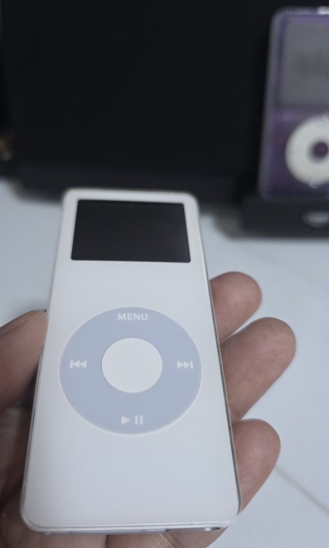 iPod nano 1st gen (Category: Portable Music Players) located in Quezon City. Submitted by true_hiddenfinds_2026 (Listing ID 1466029953, Image 1). Description: iPod nano 1st gen. 4gb white version Good condition. Makinis pa. Good pa ung battery. May mga songs na din. readable sa itunes. ready na sya para sa bagong owner. Inclusions: iPod nano 1st gen with 30 pin cord only no adaptor. Mode of Payment: Gcash, BDO shipping only: Lalamove or LBC sagot
