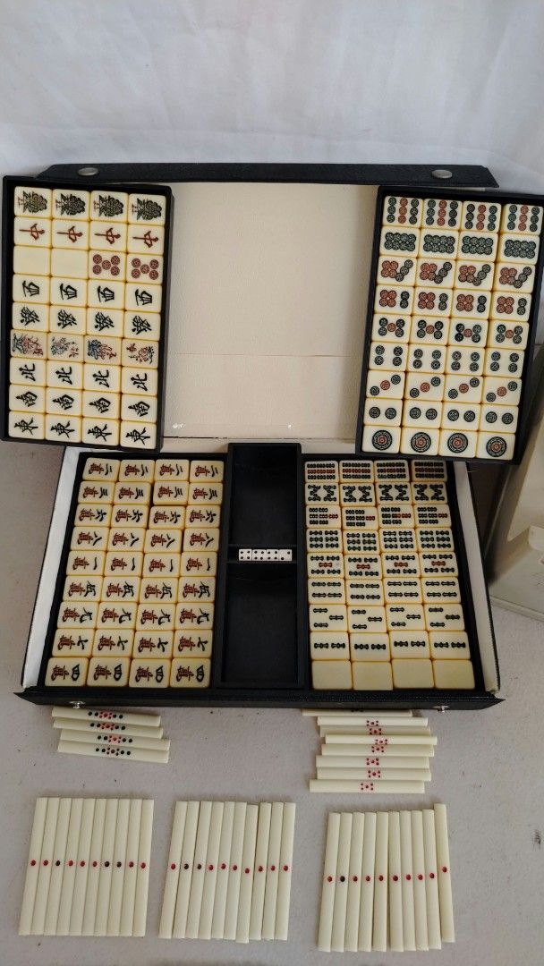 Japan Mini Mahjong Set in Black Carrying Case (Category: Board Games & Puzzles) located in Bulacan. Submitted by amarijapansurplus (Listing ID 1465960246, Image 2). Description: 📌as is 📌WYSIWYG 📌First to pay basis 📌Auto pass sa COD iwas scam sa part ko 📌MOP: GCASH 📌MOD: Pick-up, Lalamove (motorcycle) or J&T/Flash Express/SPX Express 📌Courier Wed and Sat sched 📌Return and Exchange Store Policy, Strictly No Refund 📌Loc. Panginay, Balagtas,