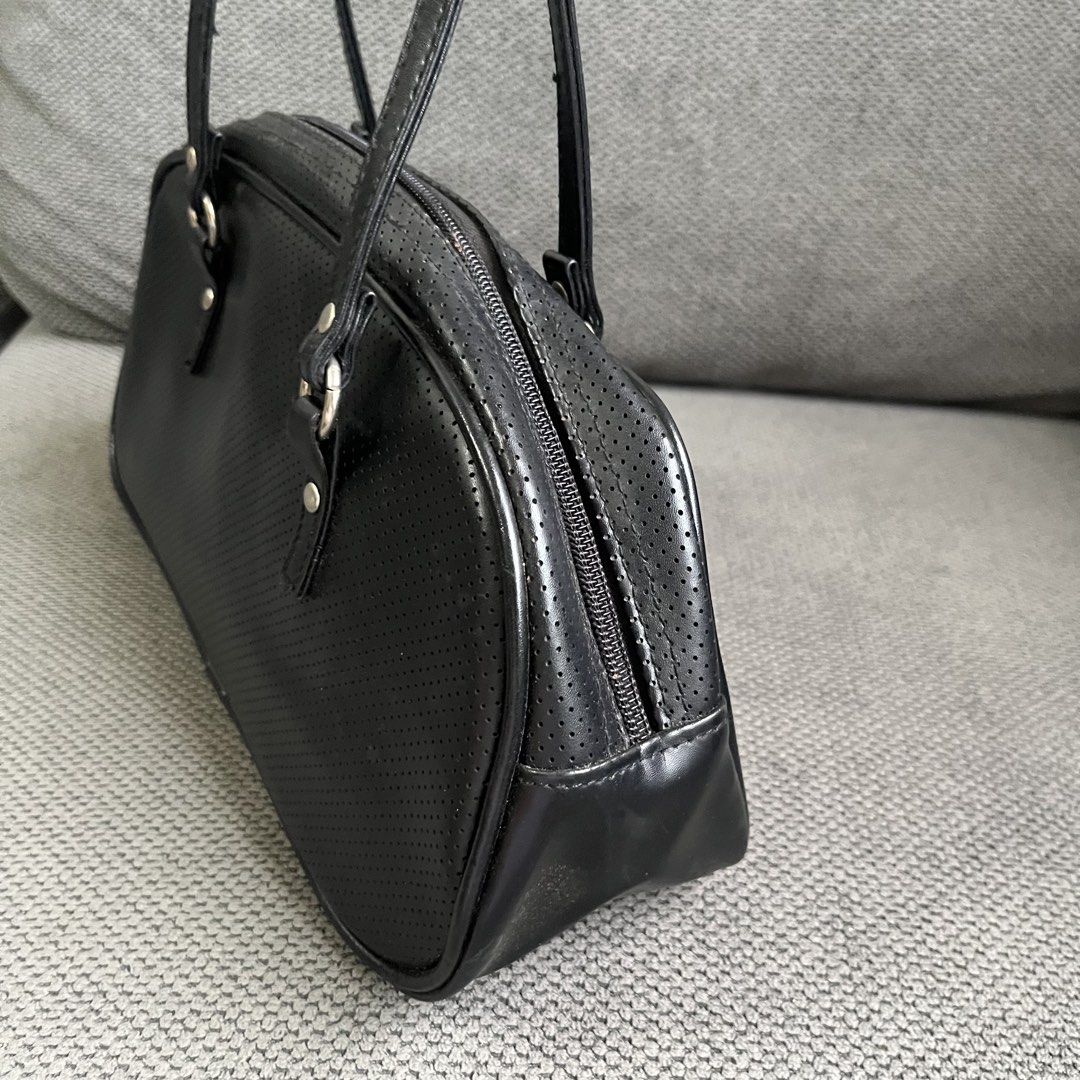Japan Y2k Long Strap Black Micro Perforated Bowling Shoulder Bag (Category: Shoulder Bags) located in Silang. Submitted by f4iry4rch1ve (Listing ID 1466015111, Image 3). Description: Japan Y2k Long Strap Black Micro Perforated Bowling Shoulder Bag 500 php+ sf Dimensions: view the pictures above -from Japan - actual photos Note: Colors may vary due to lighting Please message me for shipping and payment method....