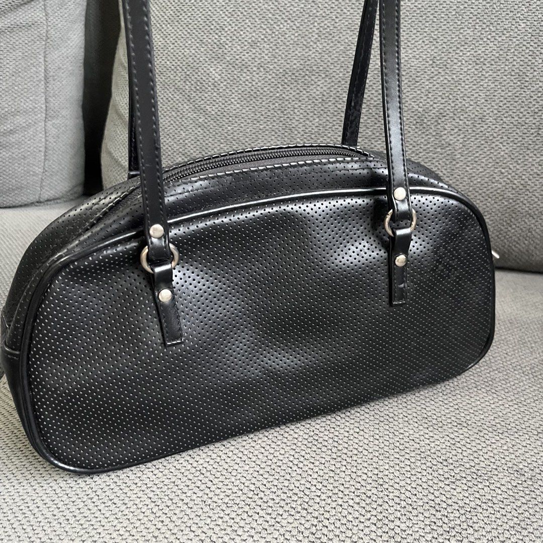 Japan Y2k Long Strap Black Micro Perforated Bowling Shoulder Bag (Category: Shoulder Bags) located in Silang. Submitted by f4iry4rch1ve (Listing ID 1466015111, Image 2). Description: Japan Y2k Long Strap Black Micro Perforated Bowling Shoulder Bag 500 php+ sf Dimensions: view the pictures above -from Japan - actual photos Note: Colors may vary due to lighting Please message me for shipping and payment method....