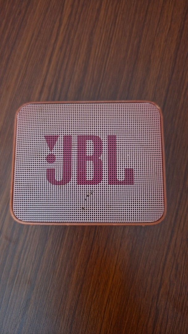 JBL GO 2 Portable Bluetooth Speaker (Category: Soundbars, Speakers & Amplifiers) located in Makati City. Submitted by regalsteppermkt (Listing ID 1465956160, Image 1). Description: - works when plugged in only to a power source - works around 10 minutes only if not plugged (fully charged) - Authentic Orange JBL GO 2 portable Bluetooth speaker - Compact square design with front speaker grille - Audio works perfectly and sounds great - Note: Rubber