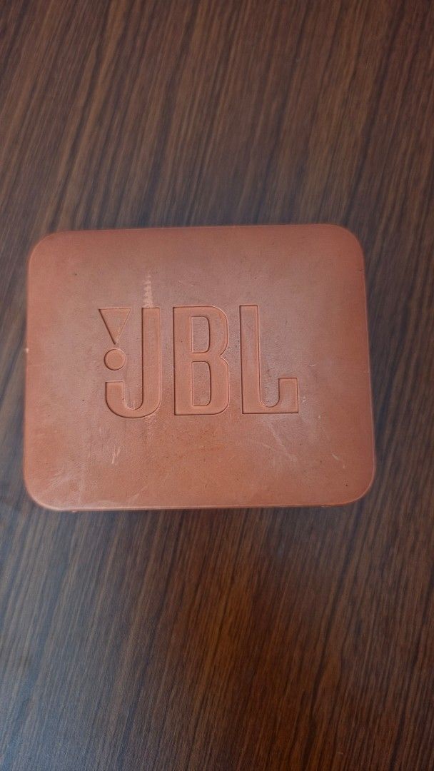 JBL GO 2 Portable Bluetooth Speaker (Category: Soundbars, Speakers & Amplifiers) located in Makati City. Submitted by regalsteppermkt (Listing ID 1465956160, Image 2). Description: - works when plugged in only to a power source - works around 10 minutes only if not plugged (fully charged) - Authentic Orange JBL GO 2 portable Bluetooth speaker - Compact square design with front speaker grille - Audio works perfectly and sounds great - Note: Rubber