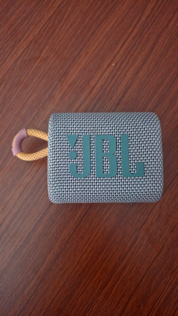 JBL Go 3 Portable Bluetooth Speaker Grey (Category: Soundbars, Speakers & Amplifiers) located in Makati City. Submitted by regalsteppermkt (Listing ID 1465956397, Image 1). Description: - only works if plugged in to a power source - Authentic JBL Go 3 portable wireless speaker - Color: Sleek Grey with Teal accents and vibrant Orange carry loop - Compact, grab-and-go design with a stable rubberized base - Easy-to-use tactile top controls and side 
