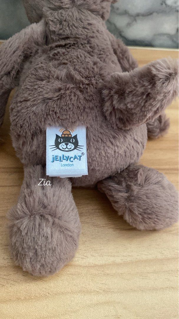 Jellycat London Bashful Reindeer Small (Category: Plushies & Soft Toys) located in Caloocan City. Submitted by izzyjelly (Listing ID 1465965811, Image 2). Description: Free shipping✅✅✅ - Brand: Jellycat London - Item: Brown reindeer plush toy - Design: Sitting style with beans inside for stability - Features: Soft brown fur, dark brown antlers, and a white snout - Condition: Brand new with original cloth tags and washing instructions attached - S