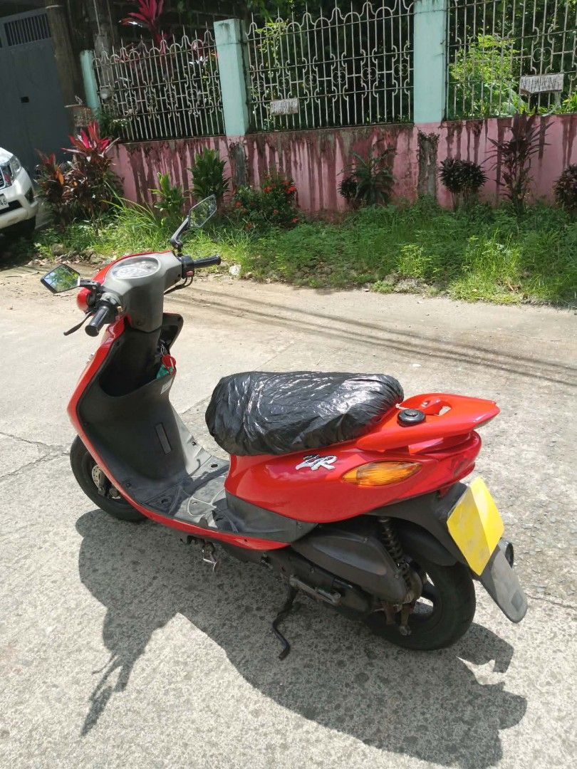 Jog zr (Category: Announcements) located in Cainta. Submitted by jhenjjd06 (Listing ID 1466022410, Image 3). Description: : Selling a Yamaha Jog ZR 50cc scooter in bright red body finish. Great for quick runs, neighborhood errands, or private property use. Key Details: Engine Size: 50cc Condition: Excellent running condition, smooth engine, ready to ride Status: No papers (No OR/CR) — ideal for personal, subdivision, or farm/project use Features: