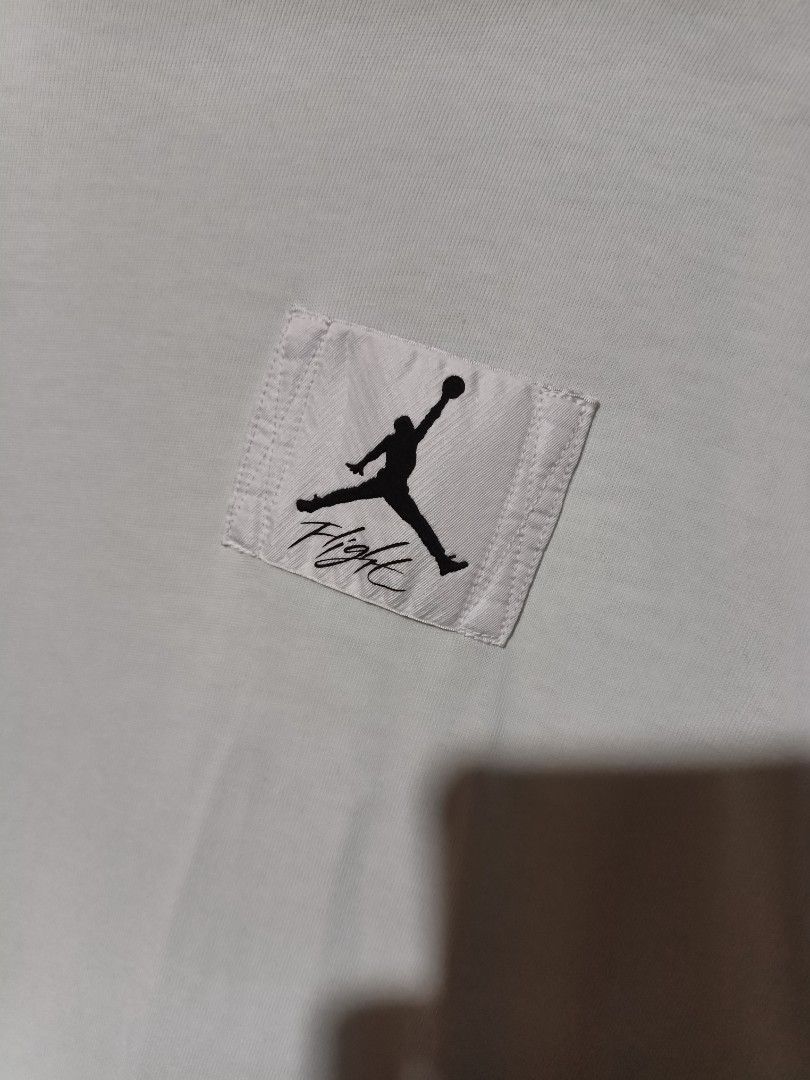 Jordan Flight White T-Shirt (Category: Tshirts & Polo Shirts ) located in Maasim. Submitted by ukayganda25 (Listing ID 1466022672, Image 2). Description: - Authentic white Jordan Flight t-shirt - Features a subtle embroidered Jumpman logo patch on the left chest - Classic crew neck with a comfortable relaxed fit - Made from breathable, high-quality cotton fabric - Standard PH sizing - Condition: Brand new / Excellent (ready to ship).