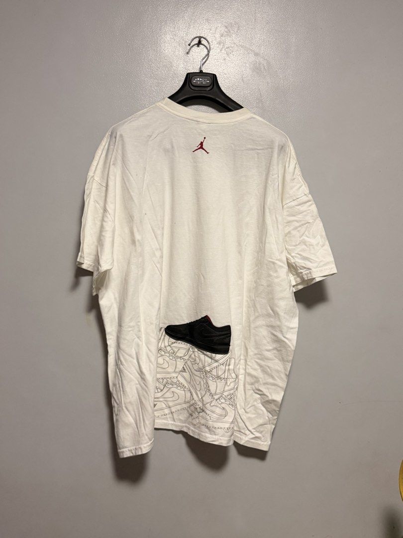 Jordan White Graphic T-Shirt (Category: Tshirts & Polo Shirts ) located in Manila. Submitted by swiftgem.eeb06e (Listing ID 1466080174, Image 2). Description: DIMES: 29 x 31 inches.