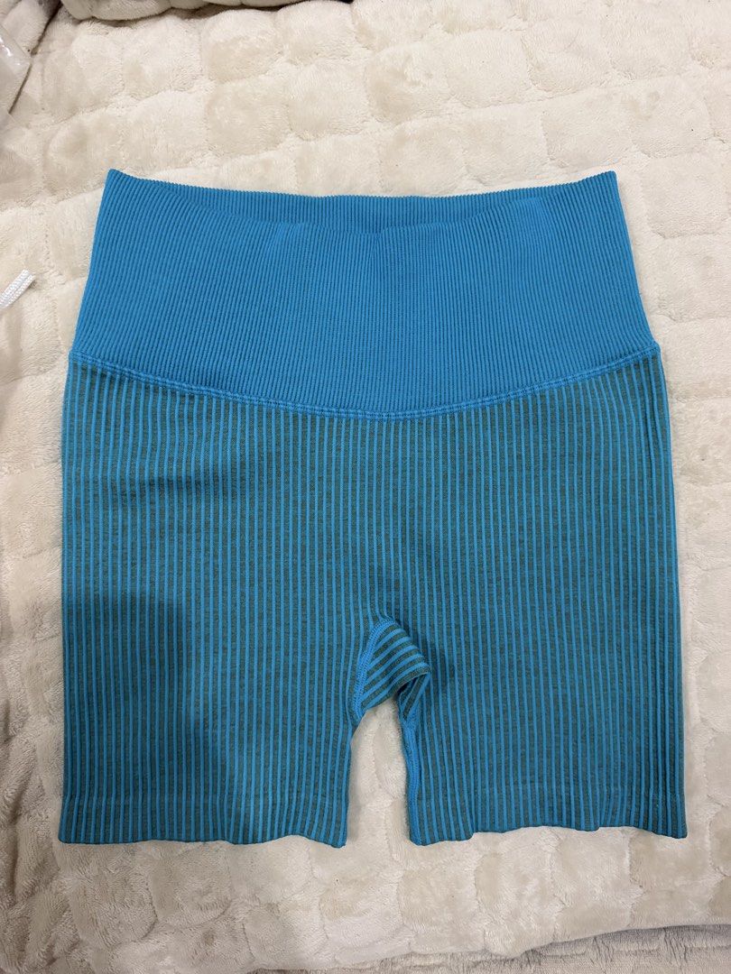 Joy Lab Ribbed Seamless Workout Shorts Small Blue (Category: Activewear) located in Cabuyao City. Submitted by _pinkvv2000 (Listing ID 1466014390, Image 2). Description: - Brand: Joy Lab - Item: Seamless ribbed shorts - Color: Vibrant blue - Size: Small (tag attached) - Material: Nylon blend - Fit: High-waisted with a supportive thick waistband - Ideal for: Gym sessions, runs, or lounging - Condition: Clean and ready to wear.