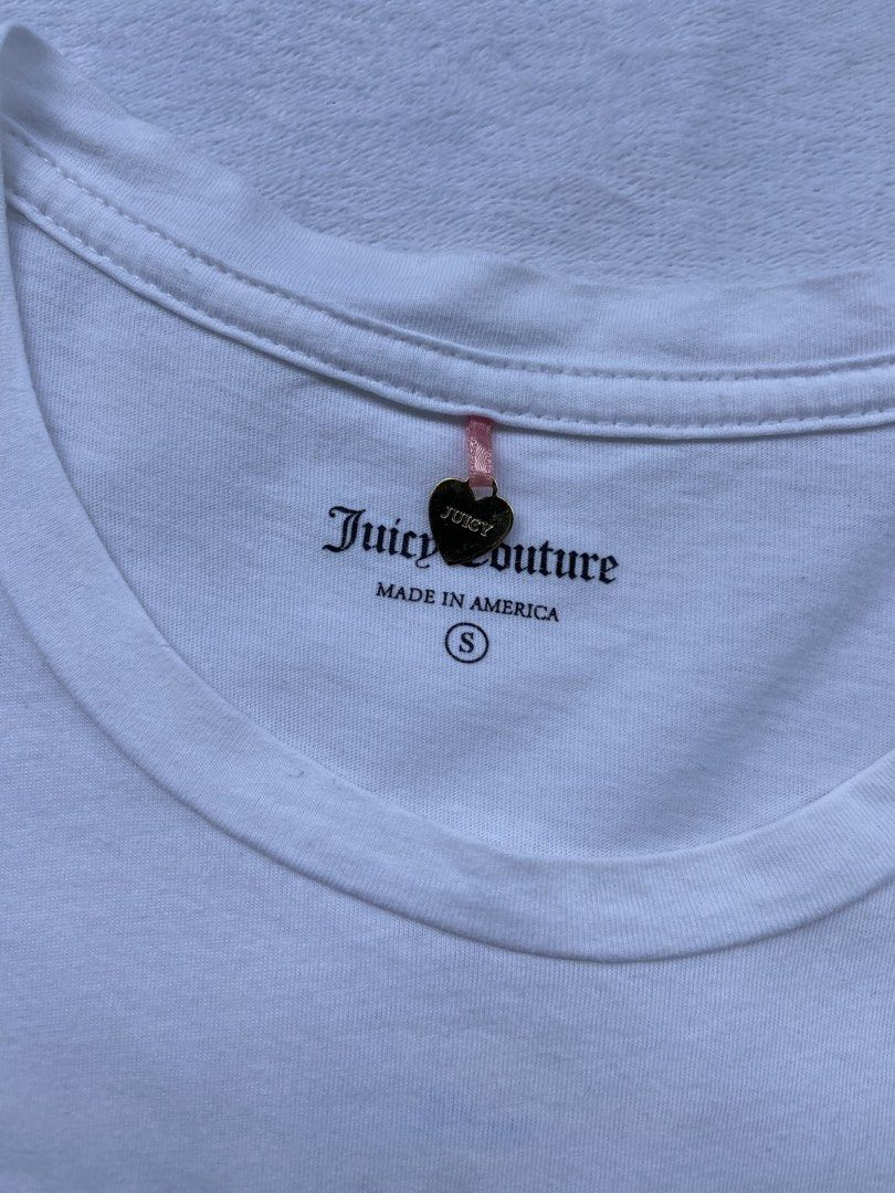 Juicy Couture Tee (Category: Blouses) located in General Santos City (Dadiangas). Submitted by kala_chuchi (Listing ID 1465960899, Image 2). Description: Size. Small 13 inches width 23.5 inches length Flaws. Missing few gems Over all condition Excellent .