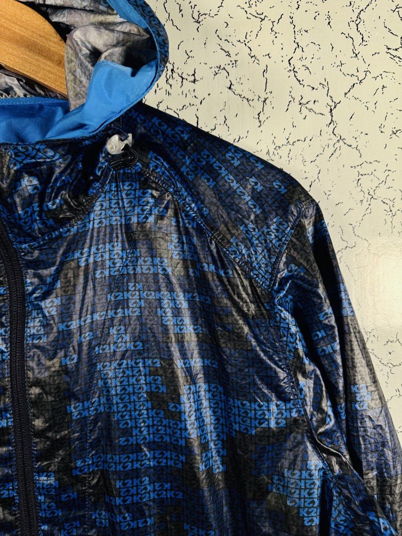 K2 Blue & Black Patterned Hooded Windbreaker Jacket Size 95 (Category: Coats, Jackets and Outerwear) located in Roxas City. Submitted by patsquarephantz (Listing ID 1466087077, Image 2). Description: - Brand/Model: K2 Hooded Jacket - Color/Design: Blue and black with all-over K2 pattern - Size: Korean 95 (fits like Medium) - Material: 100% lightweight polyester - Features: Full zip front, zippered side pockets, adjustable hood and hem drawstrings