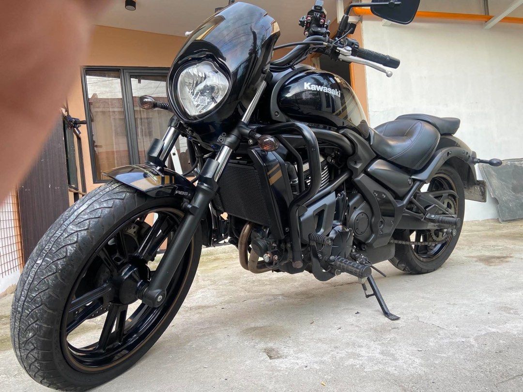 Kawasaki Vulcan S ABS Cruiser Motorcycle (Category: Motorbikes for Sale) located in Manila. Submitted by 9ecamsanto32077 (Listing ID 1466065327, Image 3). Description: Kawasaki Vulcan S cruiser motorcycle. Black and gold paint scheme with matching striped accents on the tank, fenders, and wheels. Equipped with ABS brakes, front crash bars, black exhaust pipe, and a small windshield cowl. Comfortable contoured seat setup. Clean bike overall, ready