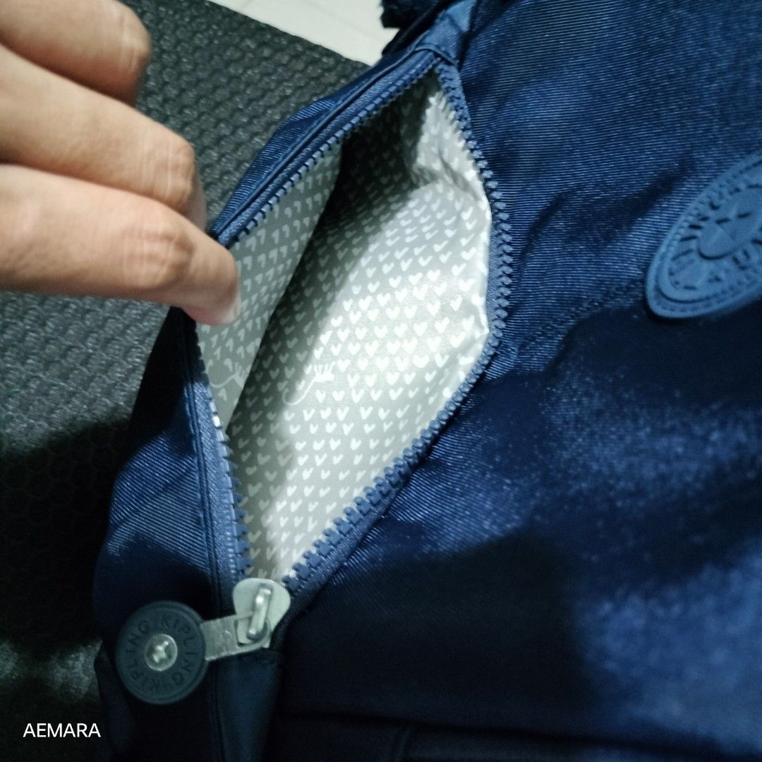 Kipling Blue Backpack (Category: Backpacks) located in Caloocan City. Submitted by almaeternamara (Listing ID 1456607402, Image 3). Description: Kipling Backpack - Blue in color Mall pull out 5 compartment with 2 side pockets I have 2 pcs Strictly payment first Sf shouldered by buyer No COP or COD Loc: Brgy 168 North Caloocan.
