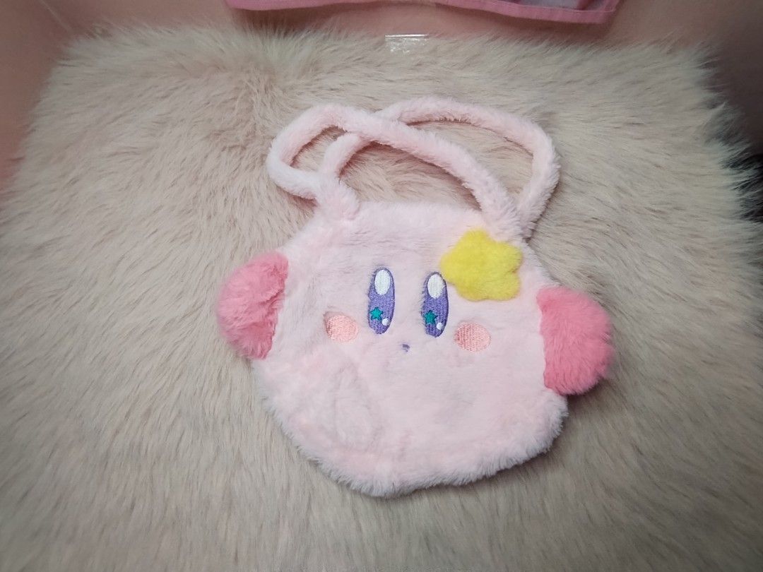Kirby plush tote bag pink fluffy (Category: Shoulder Bags) located in Paombong. Submitted by eandj.shop (Listing ID 1466045995, Image 3). Description: 🎀 Adorable pink Kirby character tote bag 🎀 Made from ultra-soft plush fabric all over 🎀 Features cute embroidered eyes, pink cheeks, and a yellow star accent .
