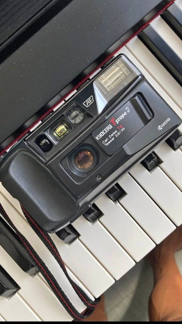 Yashica T3 Super (Category: Cameras) located in Pasig City. Submitted by 2grimey (Listing ID 1466008238, Image 1). Description: For Sale: Kyocera T Scope 2 (Yashica T-3 Super) Near mint condition Equipped with the legendary Carl Zeiss Tessar T* 35mm f/2.8 lens — known for its very sharp rendering, rich contrast, and premium cinematic look. • f/2.8 aperture • Very sharp Zeiss lens • No haze • No fungus • Clear viewfinder • Clean top scope finder •